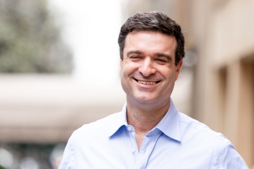 Dayforward founder and CEO Aaron Shapiro smiles for a photo outside.