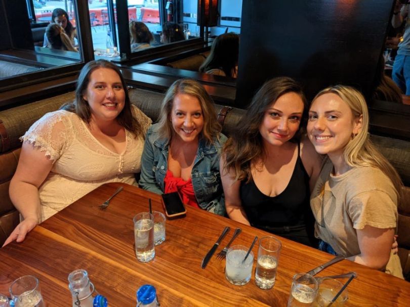 AdTaxi team members at a restaurant together