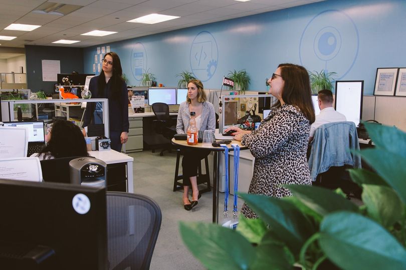 Adage Technologies team members in the office