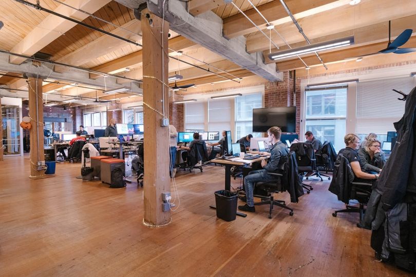 Aloft team members working at the office