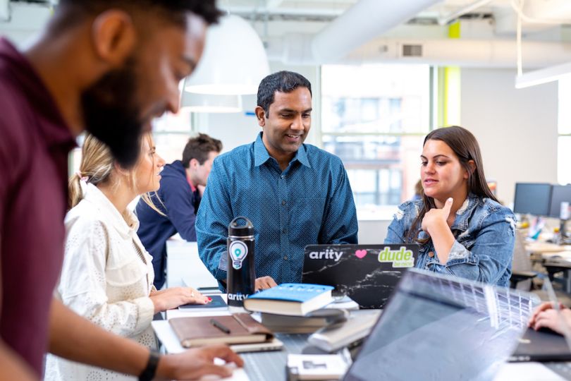 Arity team members working