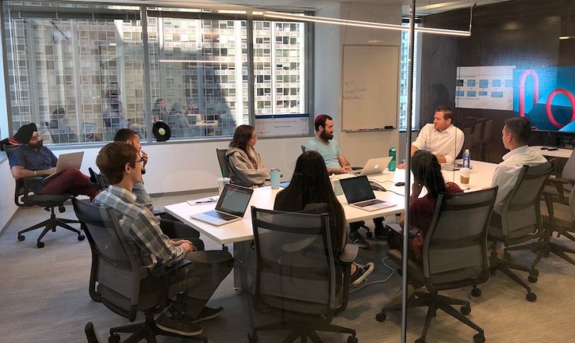 Ascent team working in a conference room
