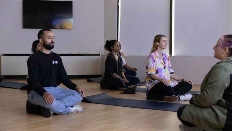 Audible team members doing yoga