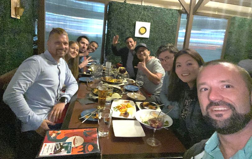Aura team members out at a restaurant together