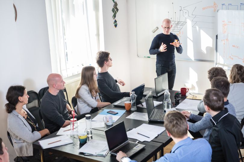 Professionals having a meeting - scope creep