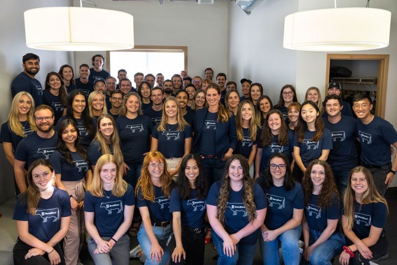 The Barn2Door team standing together in the office.
