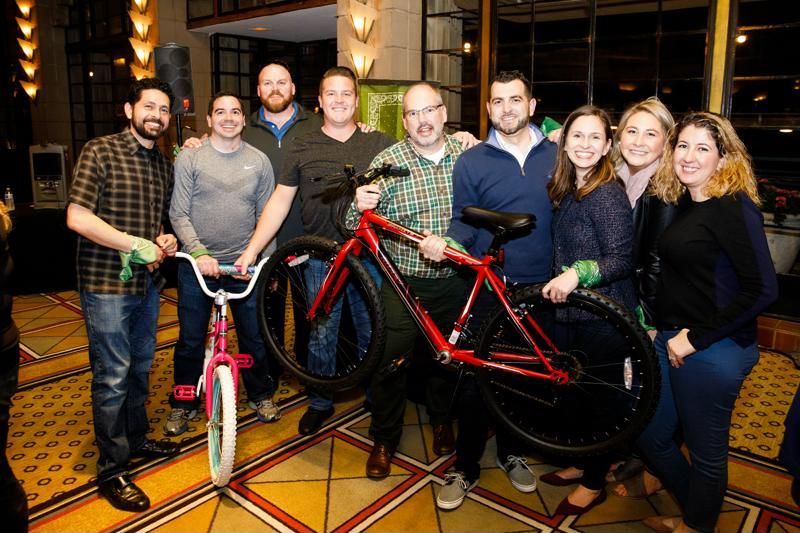 AIR Communities staff builds a bike