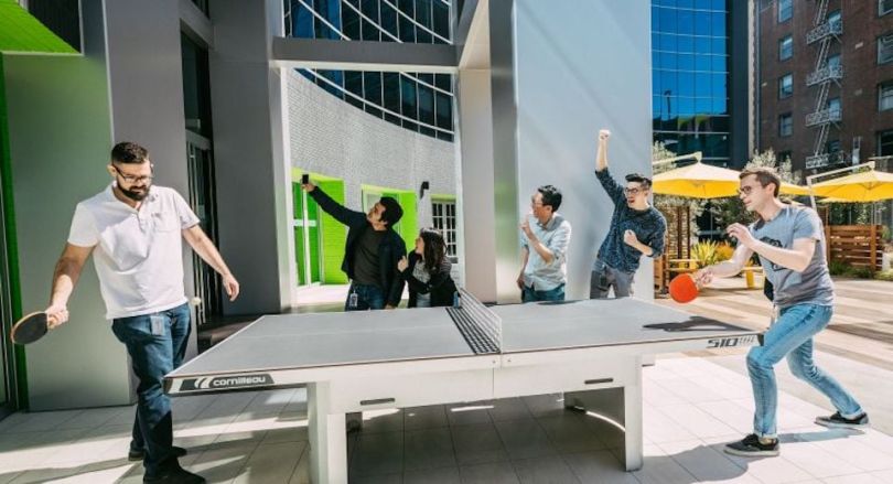 Funraise team playing ping pong