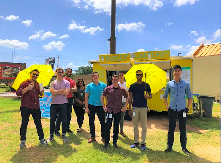 A group of employees together during a team outing.