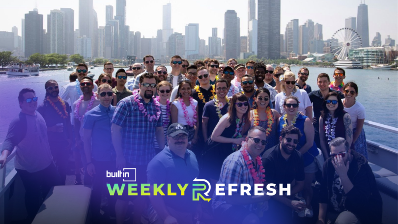 A group photo of the Productive Edge team in front of the Chicago skyline.