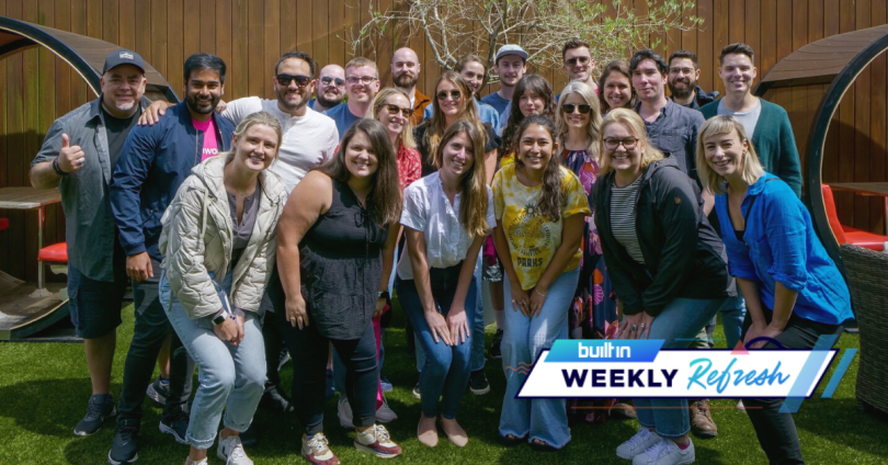 Teamwork’s Denver team smiles for a photo outside.