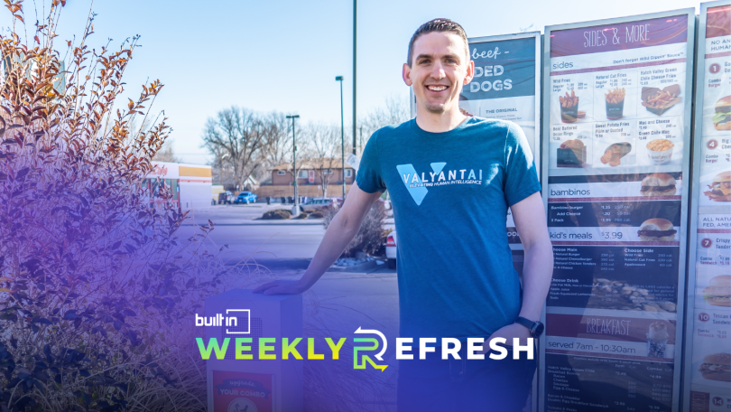 Rob Carpenter, CEO and founder of Valyant AI, stands against a restaurant's drive through box.