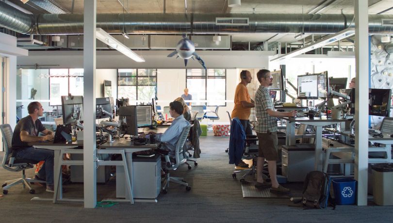 The Trade Desk employees working in their office