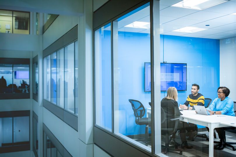 Cleacover engineers in a meeting