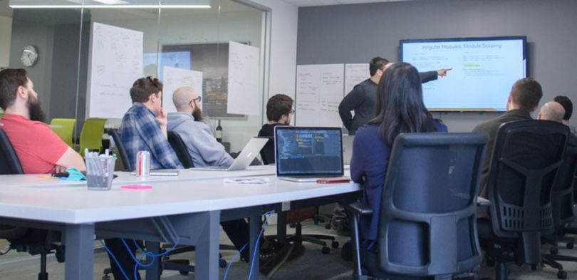 CarrierDirect team working in a conference room