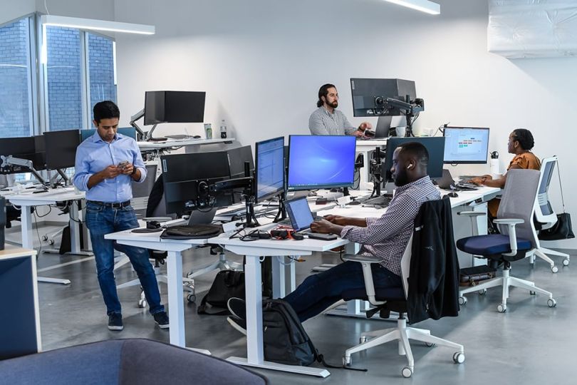 Cart.com office with team members working on computers