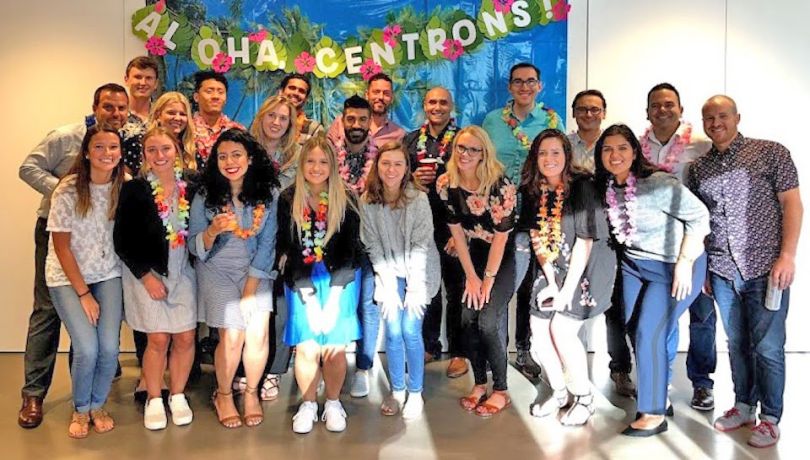 Centro team in tropical-themed group photo