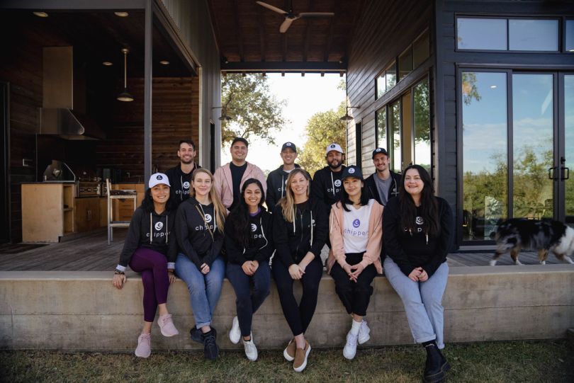 Chipper team members outside on a deck