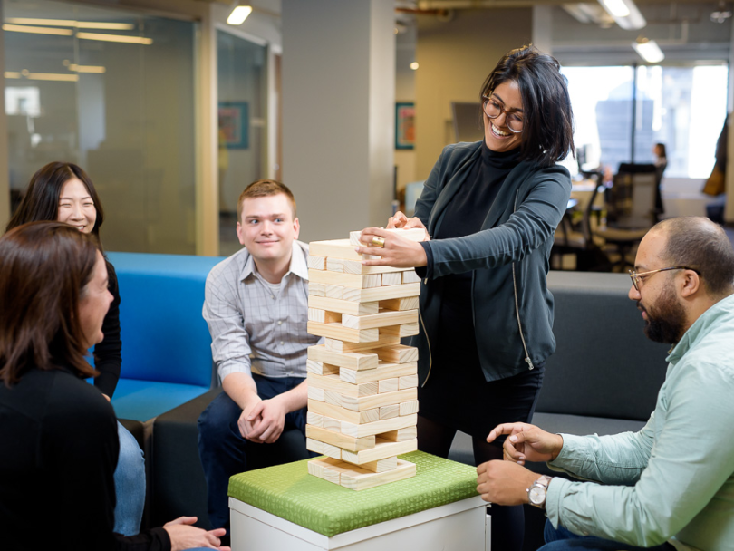 CityBase team playing Jenga