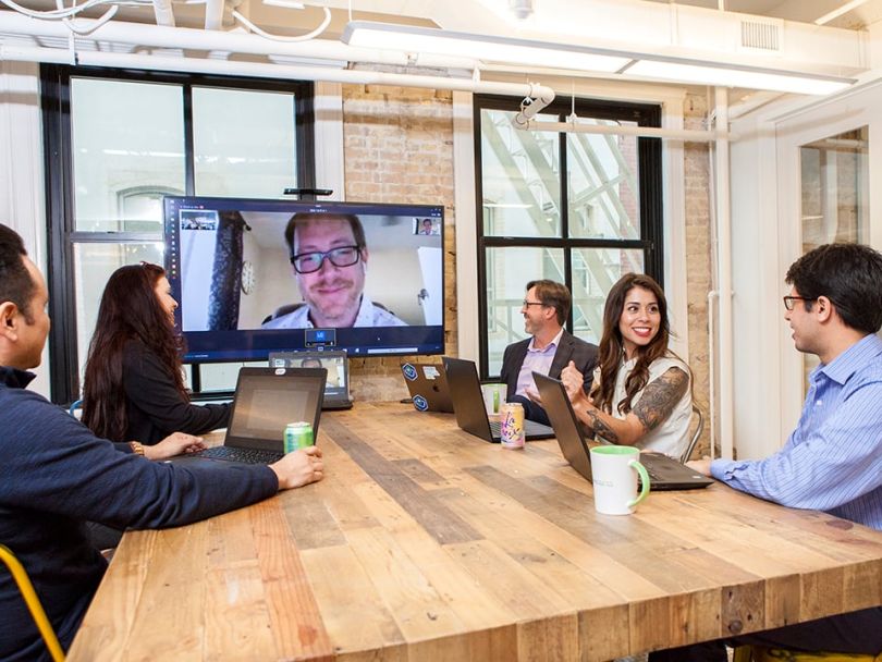 The ClearDATA team collaborating in the office