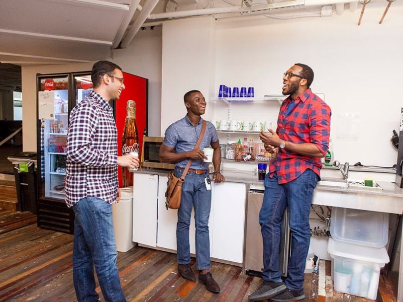 Members of the ClearDATA team catching up in the office