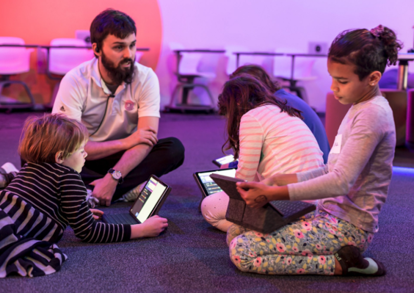 Codeverse employee teaching children