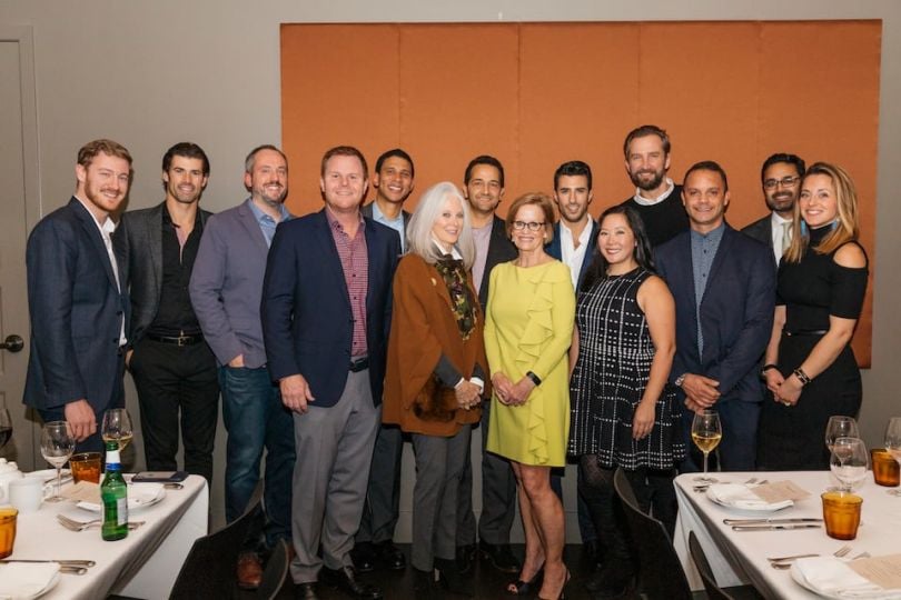 Compass team at a banquet