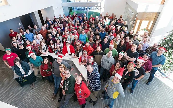 Overhead group photo of DAT team members