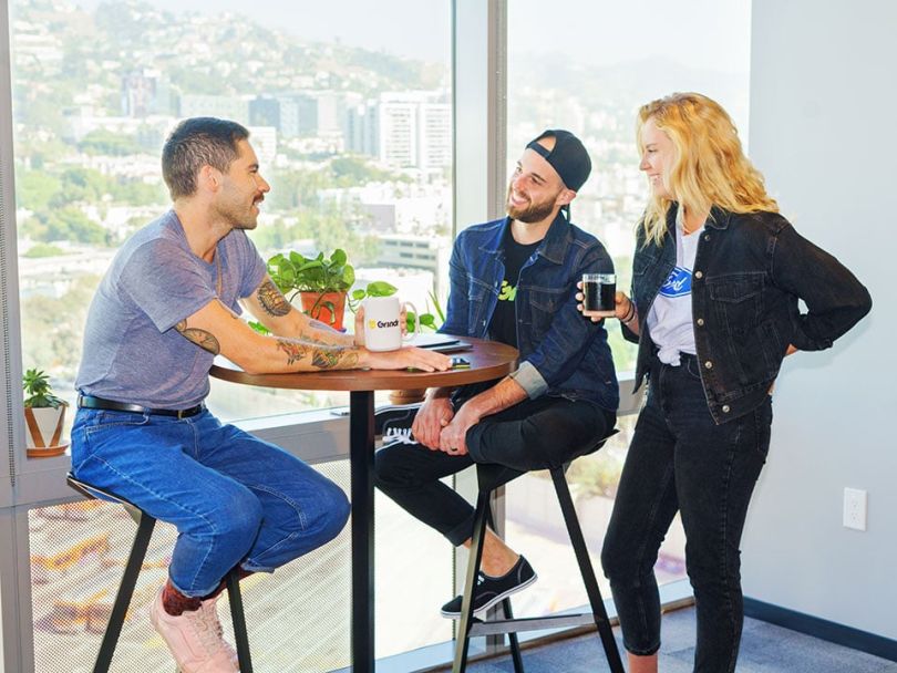 The team at Grindr working in the office