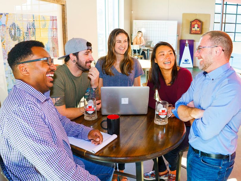 Employees laugh at SteelHouse