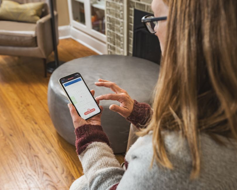 Patient using the DispatchHealth app. 