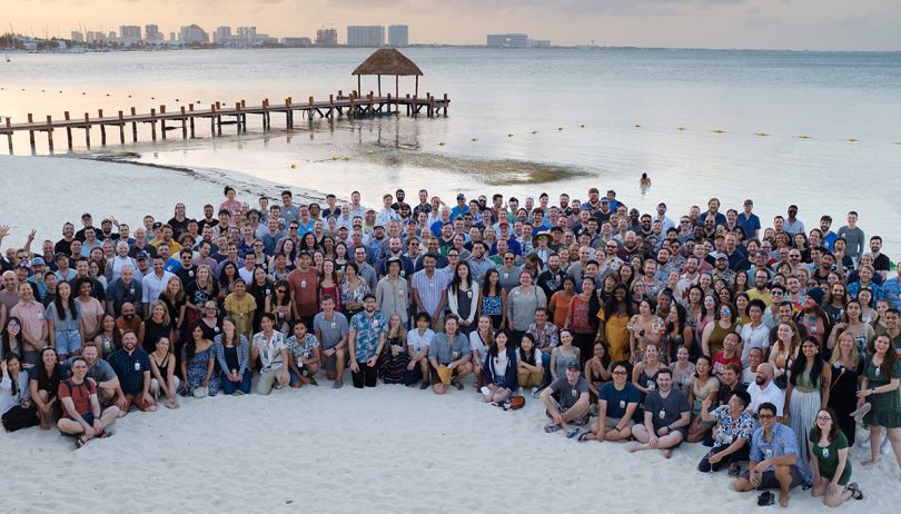 Doximity team photo on a beach