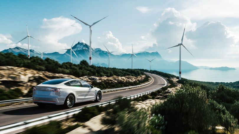 Electric car driving on a road