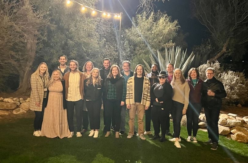 Provi team members pose for a group photo at a company event.