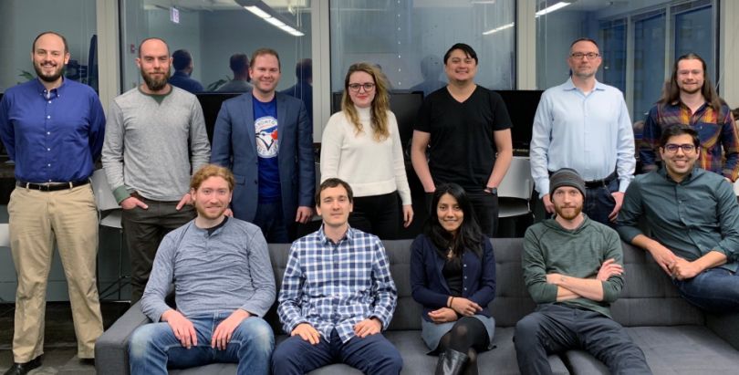 GreenKey Technologies team in a group office photo