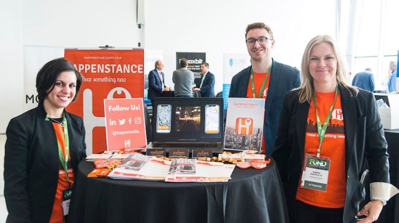 Happenstance founders at a conference