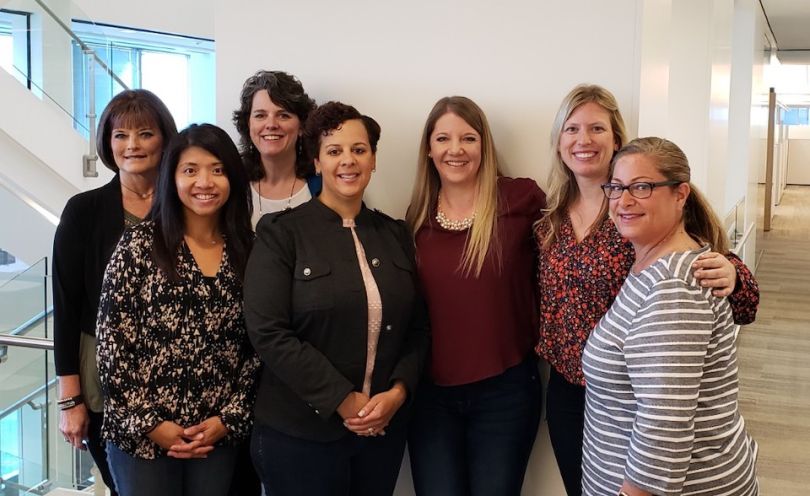 HAVI staff pictured in their office
