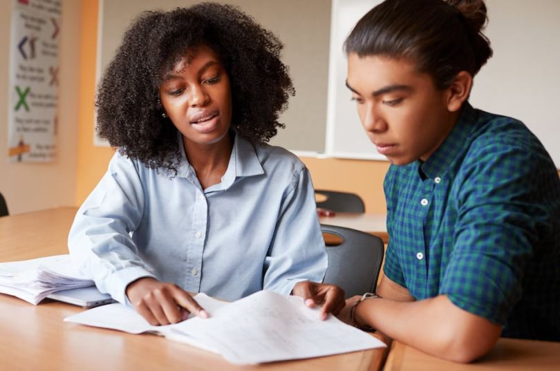 Tutor with student