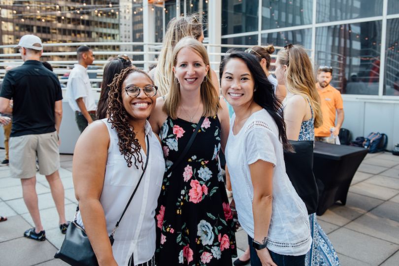 Women at Hireology smiling