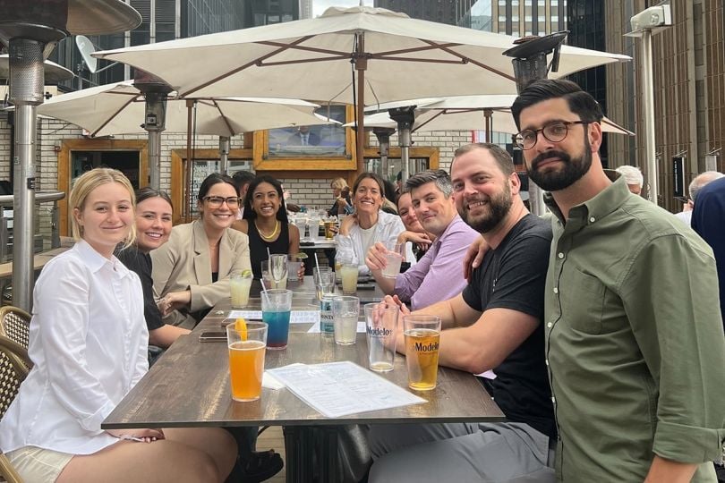 HqO team members at a restaurant together