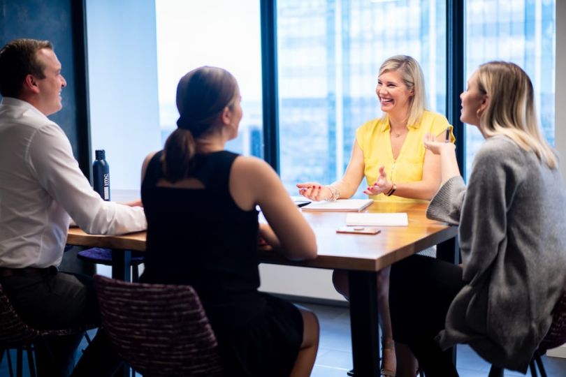 IMC Trading team members chatting