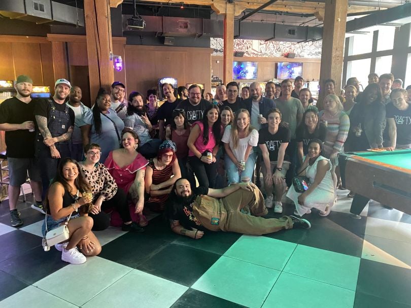Crafty's employees posing for a photo.