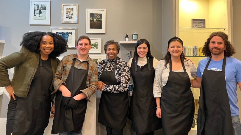 Hireology team members pose during an activity. 
