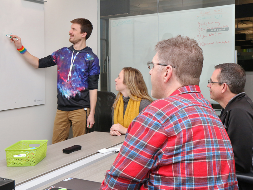 Workiva team working conference room