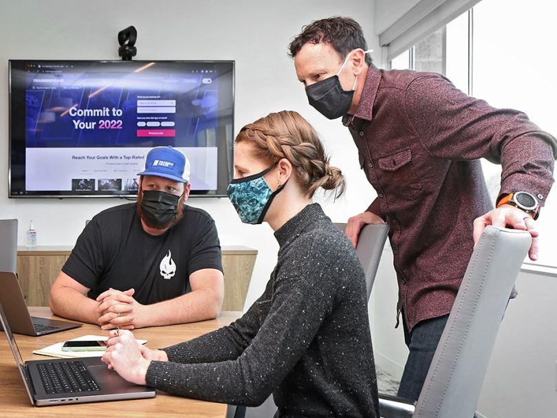 Peaksware team members having a strategy meeting
