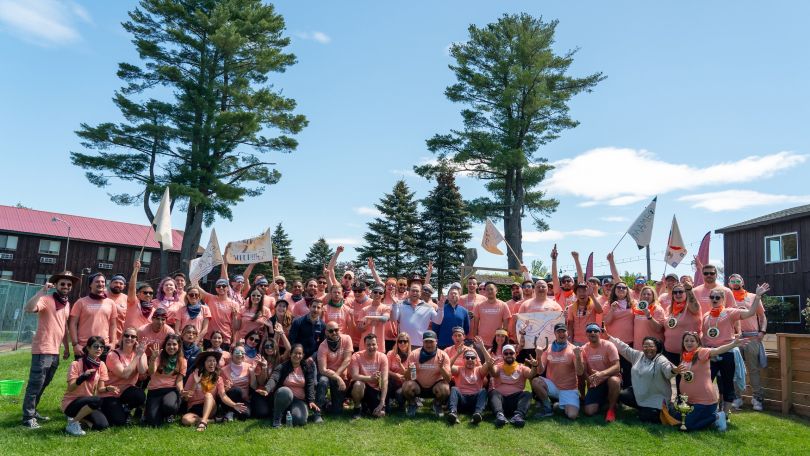 Jackpocket’s team poses outdoors for a group photo. 