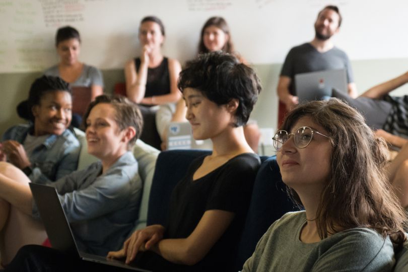 Jellyvision's team listening to a speech of some sort