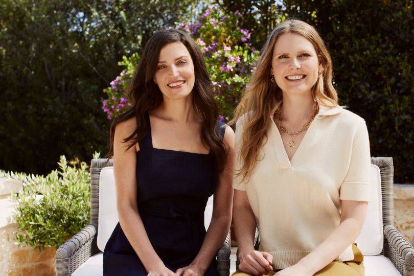 Needed co-founders Julie Sawaya and Ryan Woodbury pose for a photo.
