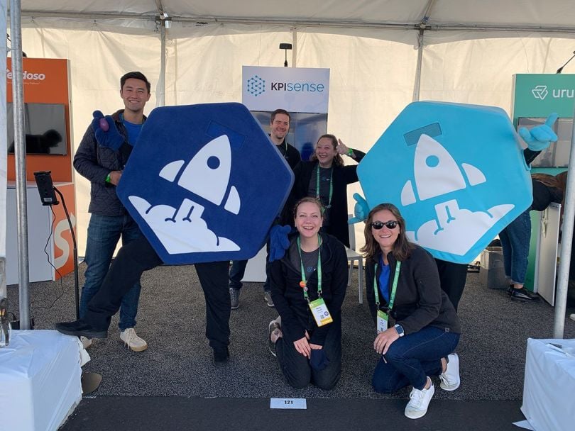 KPI Sense team members at a trade show