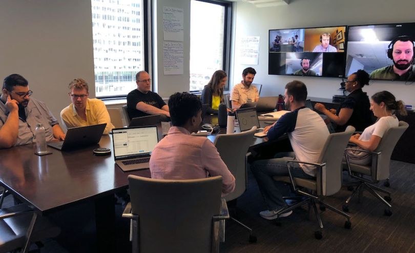 Kapow team working in a conference room